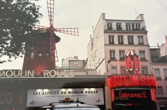 The Moulin Rouge and Its Red Windmill
